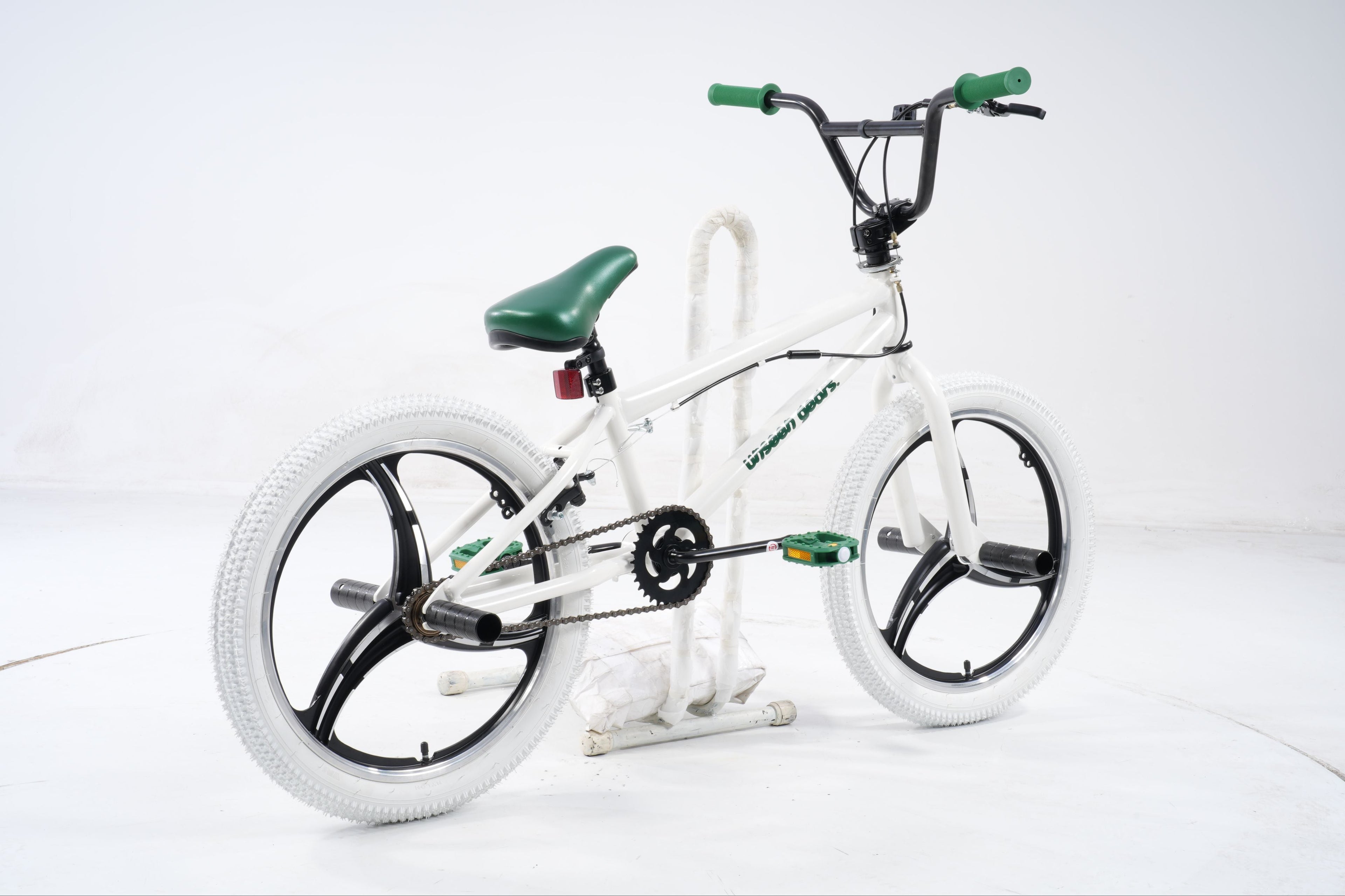 BMX Bike — white with green accents, side profile
